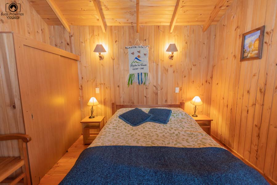 Imagem do quarto de casal da cabana do Mirador Los Volcanes
