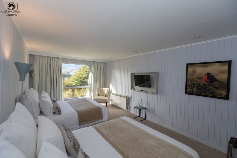 imagem da suite do hotel lago grey