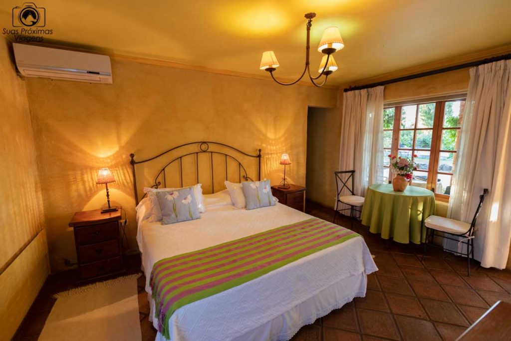 imagem da suite da pousada colchagua